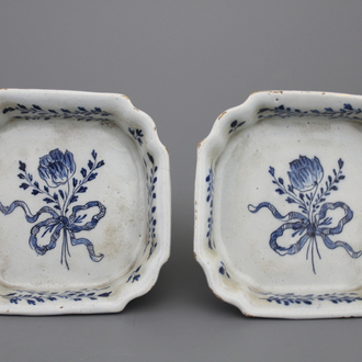 A pair of Dutch Delft blue and white flower holder stands, 18th C.