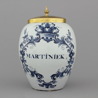 A Dutch Delft tobacco jar with brass lid, "Martiniek" 18th C.