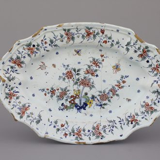 A large French faience oval dish and a salt, 18th C.
