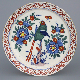 A Dutch Delft polychrome parrot plate, 18th C.