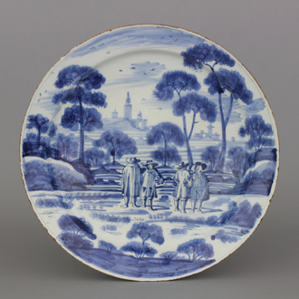 A Dutch Delft blue and white dish with a fine "open air" decoration, ca. 1720