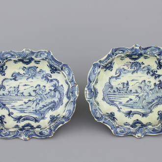 A pair of Dutch Delft blue and white saladiers with a trumpet player, 18th C.