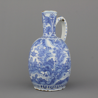 A large Dutch Delft blue and white chinoiserie jug, 17th C.