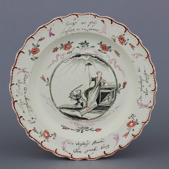 A Dutch-decorated English Leeds orangist creamware plate, 18th C.