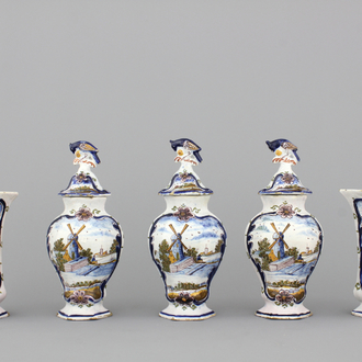 A Dutch Delft polychrome garniture with windmills, end of the 18th C.