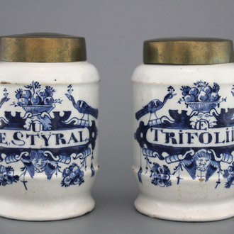 A pair of Dutch Delft blue and white pharmacy jars, albarello form, 18th C.