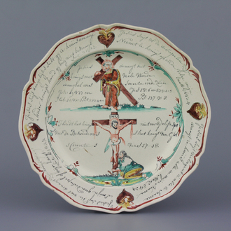 A Dutch-decorated English Leeds creamware plate with scenes from the life of Christ , 18th C.