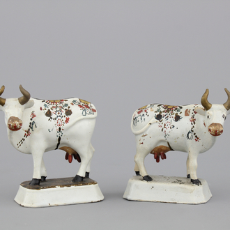 A pair of white Delft cold-painted cows, Dutch, 18th C.