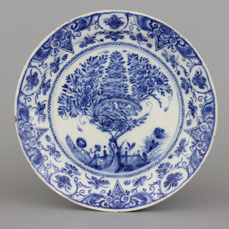A fine Dutch Delft blue and white "Tea tree" pancake plate, ca. 1700