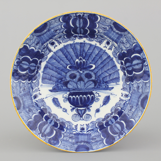 A Dutch Delft blue and white peacock's tail dish, 18th C.