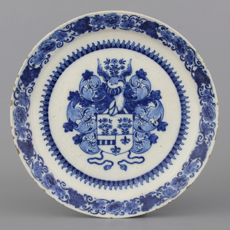 A fine Dutch Delft blue and white armorial plate, ca. 1700