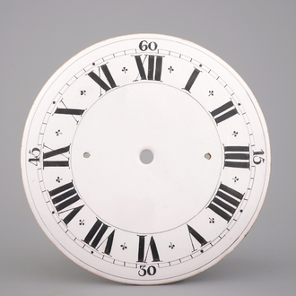 A rare English Delft clock face dial, 18th C.