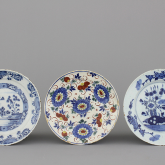 A group of 3 Dutch Delft blue and white and polychrome plates, 18th C.