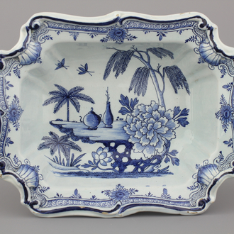 A Dutch Delft blue and white chinoiserie basin, 18th C.