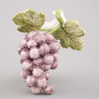 A Dutch Delft polychrome group of grapes, 18th C.