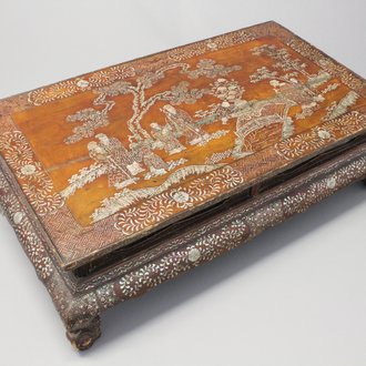 A Chinese wood and mother of pear inlaid tea table, 19th C.