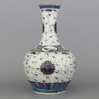 A Chinese porcelain doucai and gilt bottle vase, 19th C.