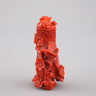 A Chinese carved dark red coral snuff bottle