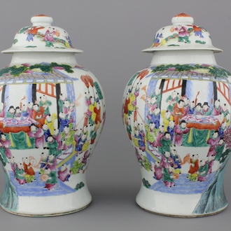 A pair of Chinese porcelain famille rose vases with "Hundred Boys" decor, 19th C.