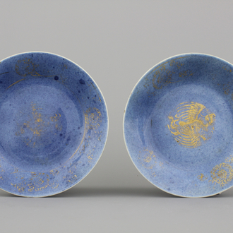 A pair of Chinese porcelain powder blue and gilt plates, 18th C.