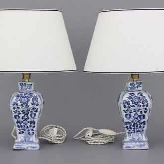 A pair of Chinese porcelain blue and white vases mounted as lamps, Kangxi, 18th C.