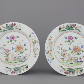 A pair of Chinese porcelain famille rose chargers, 18th C.
