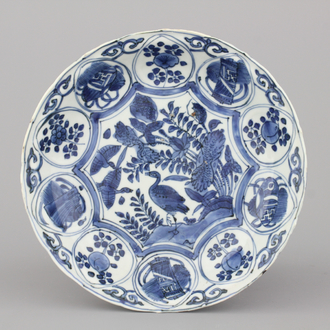 A Chinese porcelain blue and white Ming dynasty Wan-Li plate with a duck, 16th C.