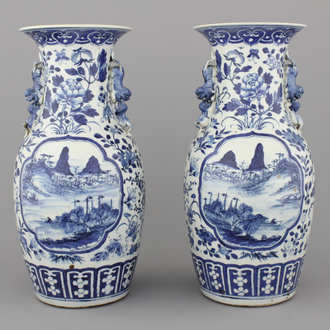A pair of blue and white Chinese porcelain vases with landscapes, 19th C.
