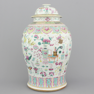 A Chinese porcelain famille rose vase and cover with a decoration of scholar's objects, 19th C.