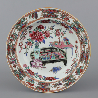 A Chinese porcelain famille rose plate with an interior, Yongzheng, 18th C.