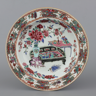A Chinese porcelain famille rose plate with an interior, Yongzheng, 18th C.