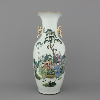 A Chinese porcelain vase with boys playing in a garden, 19/20th C.