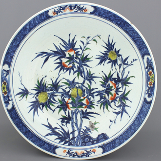 A very large Chinese doucai dish with "nine peaches" decoration, 19th C.