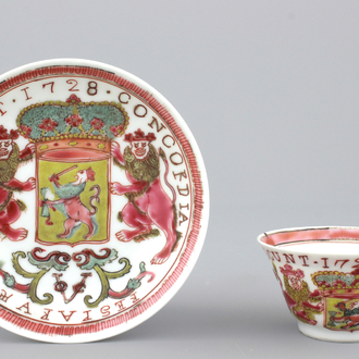 A Chinese porcelain famille rose armorial cup and saucer with VOC coat of arms, dated 1728, Yongzheng