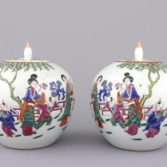 A pair of Chinese porcelain famille rose jars and covers, 19th C.