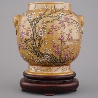 An unusual Chinese famille rose brown ground vase on stand, 19th C.
