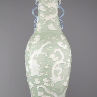 A massive Chinese porcelain celadon dragon vase, early 19th C.