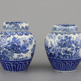 A pair of Japanese porcelain blue and white Arita jars and covers, 19th C.