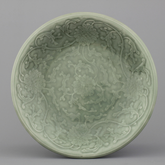 A Chinese porcelain celadon lotus scroll dish, 19th C.