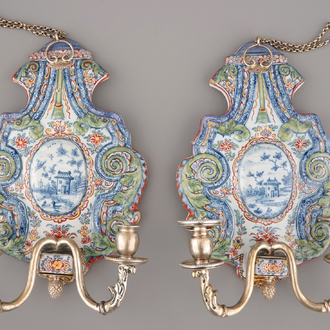 An exceptional pair of Dutch Delft wall sconces with silver, 18th C.