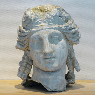 A plaster cast of a female's head, after the Antique, 19/20th C., Bruges