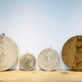 A set of four plaster casts of medallions, two showing Our-lady-of the Potterie, 19/20th C., Bruges