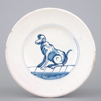 An early Dutch Delft plate with a dog, 17th C.