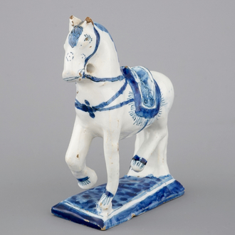 A fine Dutch Delft blue and white model of a standing horse, 18th C.