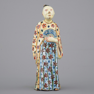 A yellow ground polychrome Dutch Delft figure of a Chinaman, 18th C.
