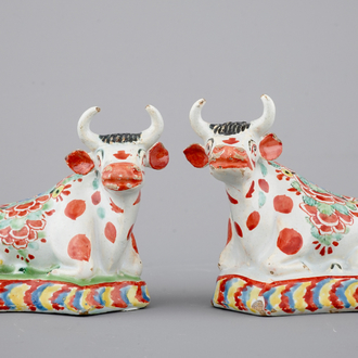 A pair of petit feu polychrome Dutch Delft cows, 18th C.