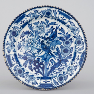 A good Dutch Delft blue and white "ribbed" dish with birds, 18th C.