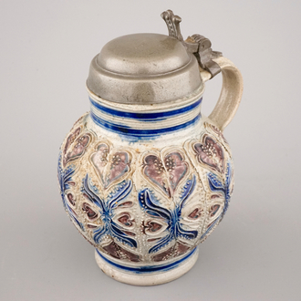 A manganese and blue Westerwald pewter-mounted globular jug, 17th C.