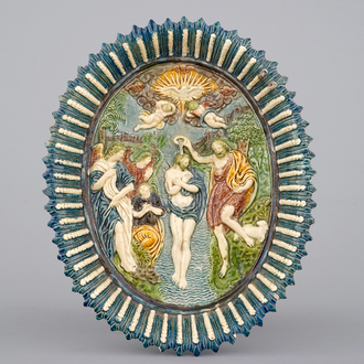 An oval Palissy style dish with the baptism of Christ, 17th C.