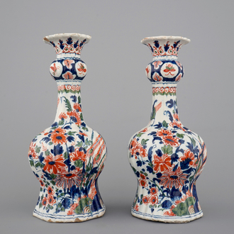 A pair of Dutch Delft ribbed garlick neck vases in cashemire palette, ca. 1700